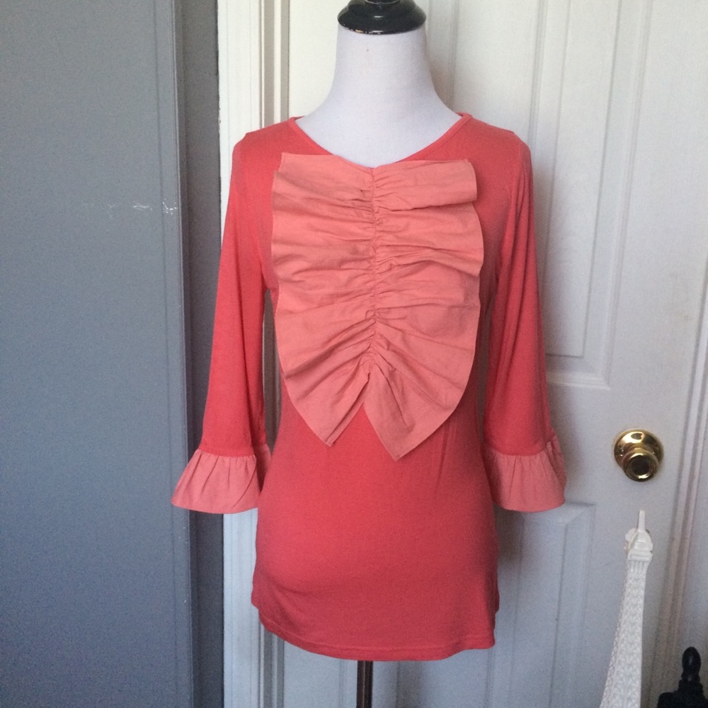 Dainty Jewell’s top. Coral ruffle top